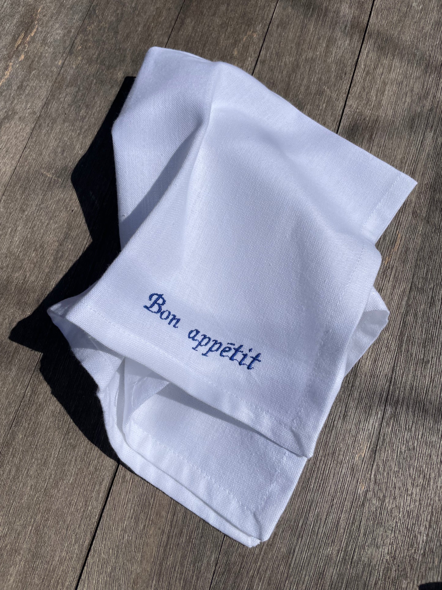 Embroidered cotton napkin ‚bon appétit‘